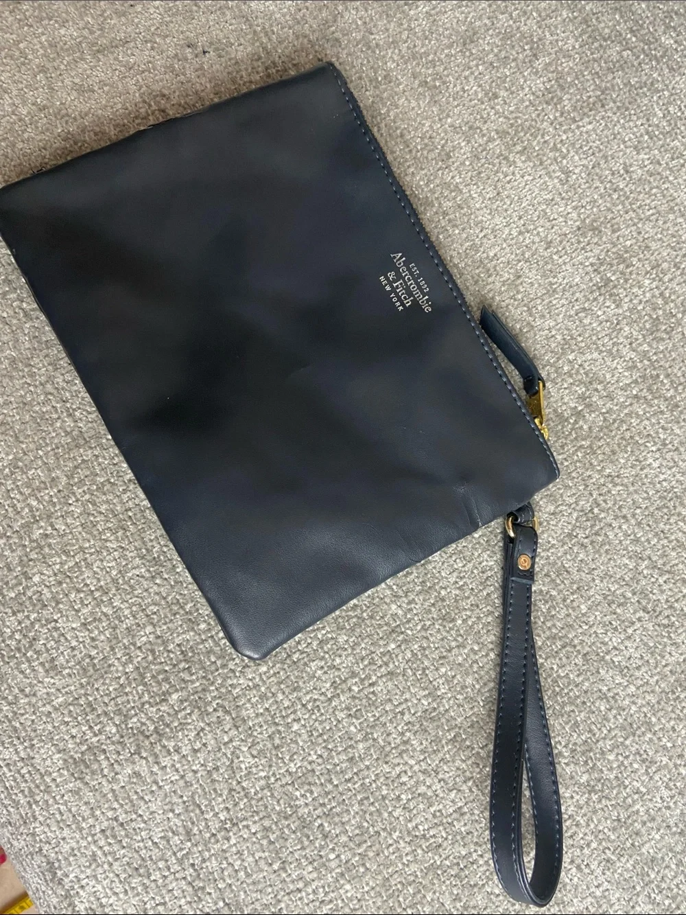 Abercrombie & Fitch Navy Pom-Pom Wristlet Clutch